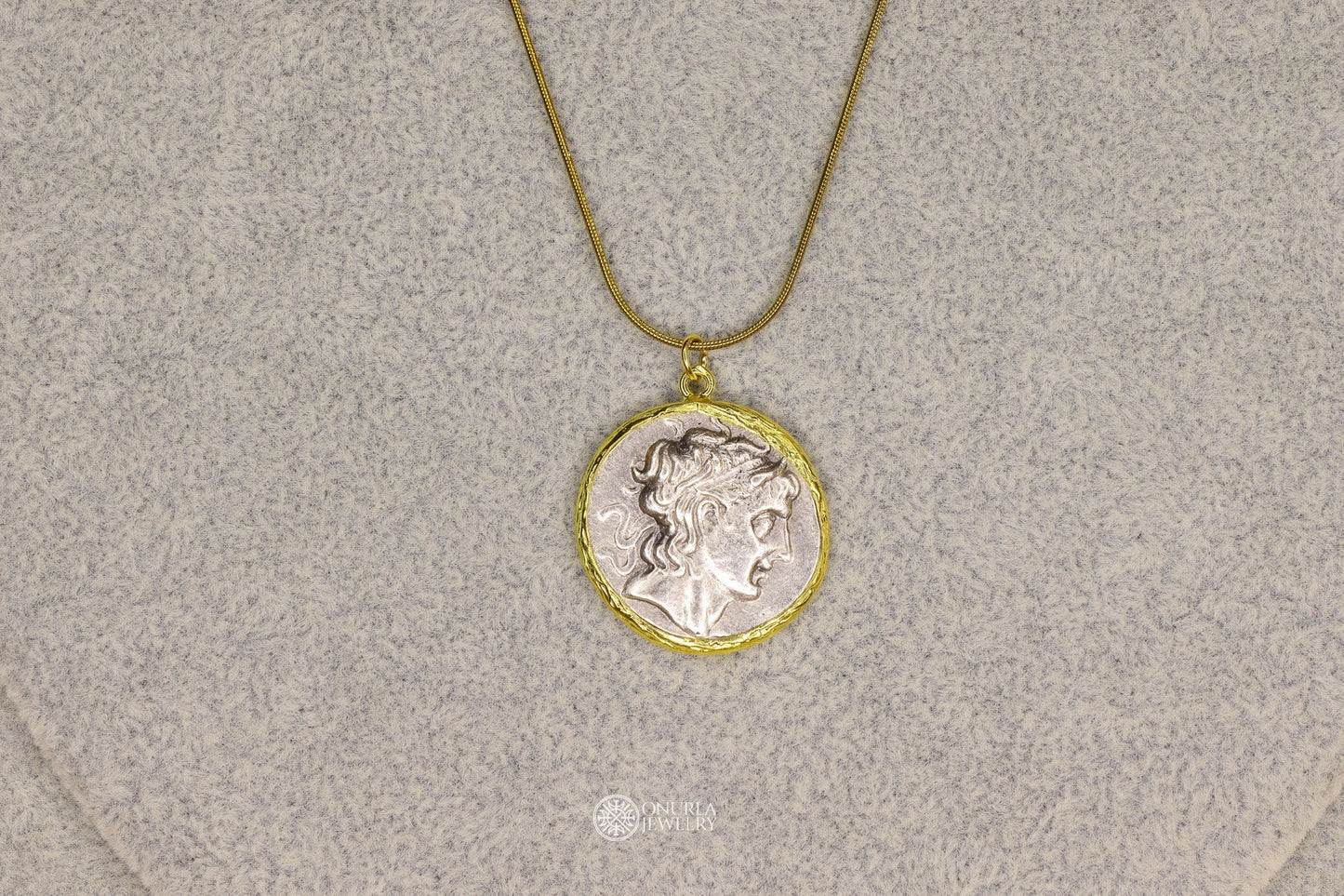 Onurla men's large Alexander the Great profile coin pendant necklace with gold frame and snake chain.