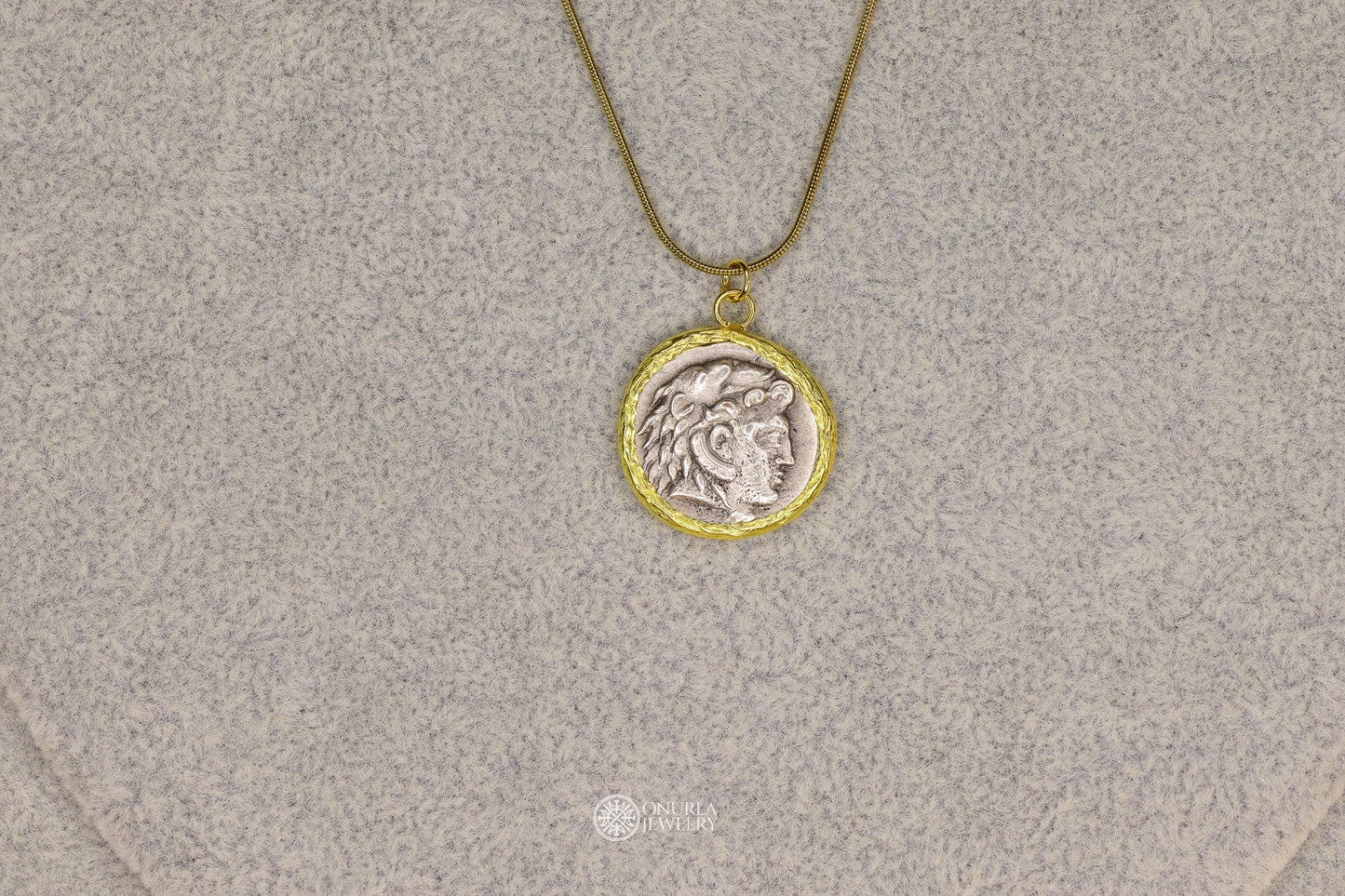 Onurla men's silver-tone pendant necklace with Alexander the Great relief on a gold-tone snake chain.