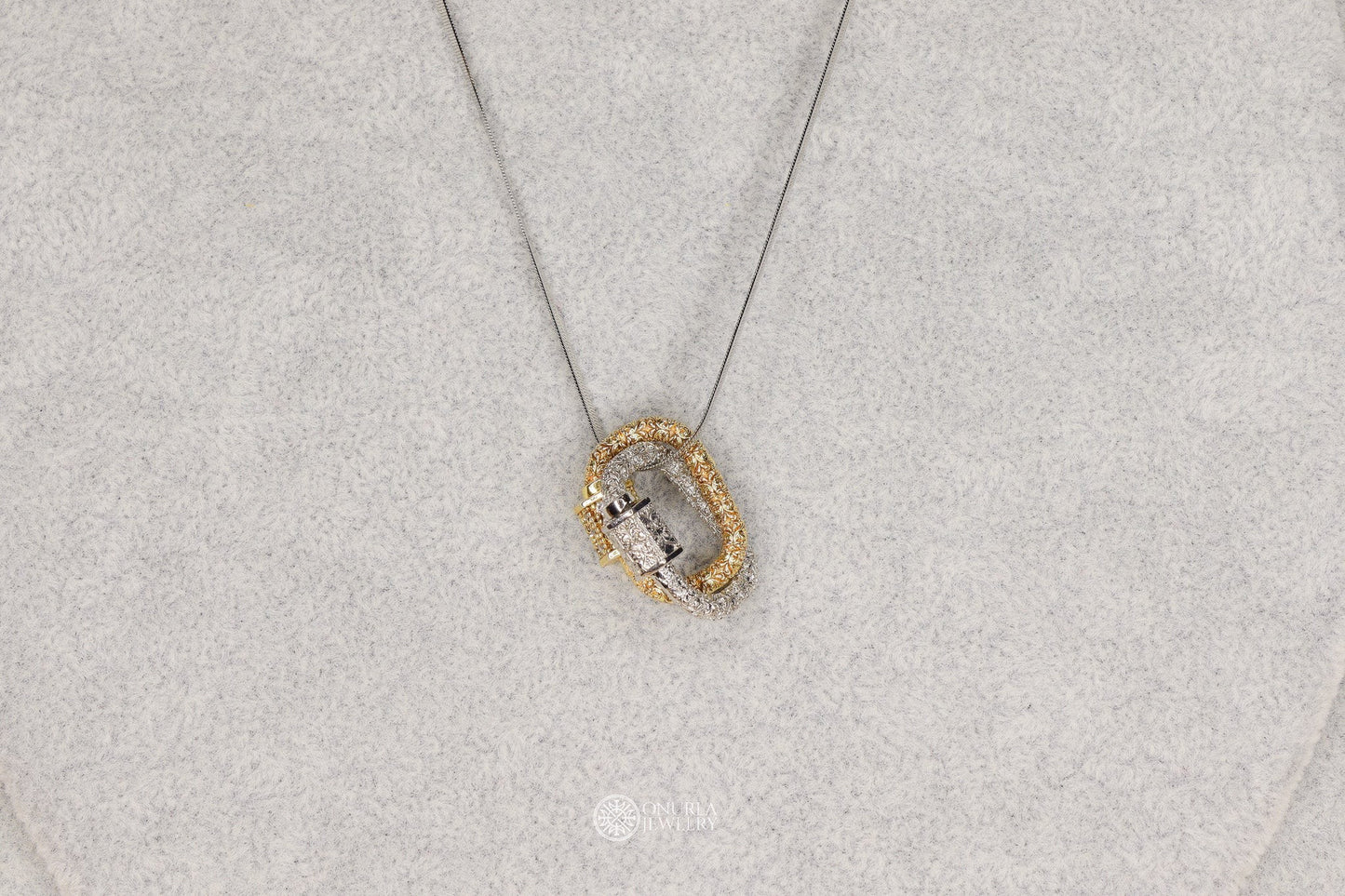 Onurla men's necklace with interlocking gold and silver carabiner pendants, fully encrusted with zircon stones on a fine snake chain.